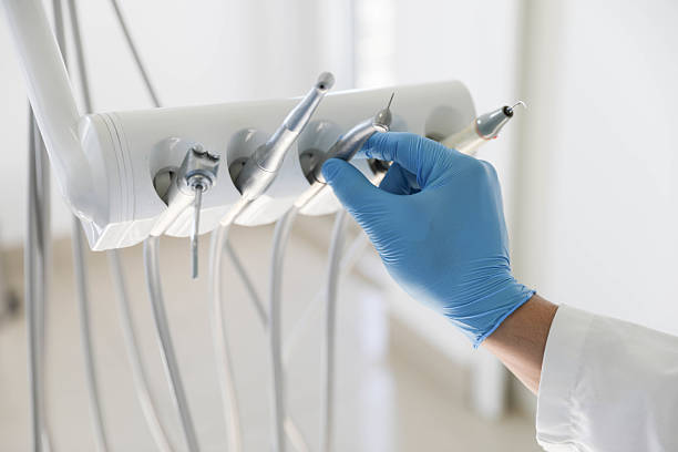 Professional Tooth Extraction technician working in Saratoga, CA